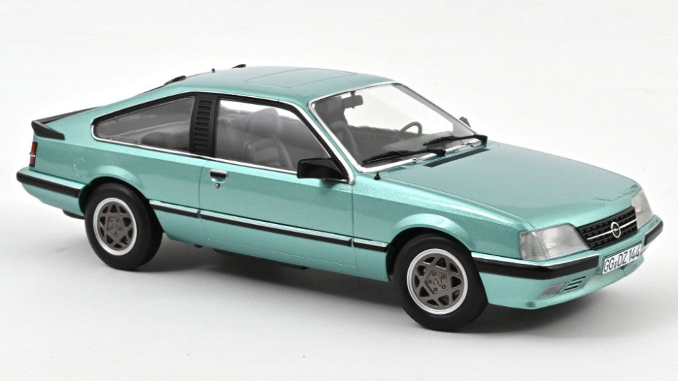 MODELLINO IN SCALA Norev COMPATIBILE CON OPEL MONZA 2.5 E 1983 BERYLL GREEN METALLIC 1:18 MODEL SCALE NV183643 241217