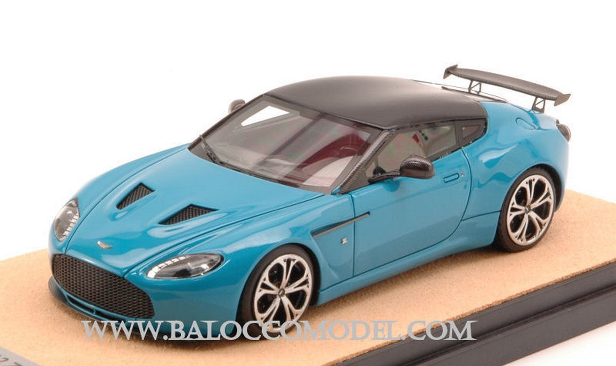MODELLINO IN SCALA COMPATIBILE CON ASTON MARTIN V12 ZAGATO 2012 BABY BLU W/BLACK ROOF ED.LIM.PCS 10 1:43 TECNOMODEL TMDMI52AZ