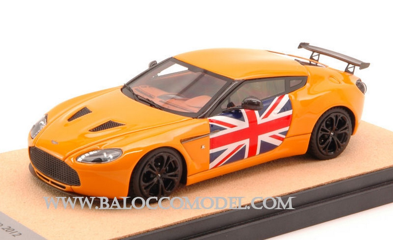 MODELLINO IN SCALA COMPATIBILE CON ASTON MARTIN V12 ZAGATO 2012 GLOSS ORANGE W/ENGLISH ED.LIM.PCS 10 1:43 TECNOMODEL TMDMI52AM