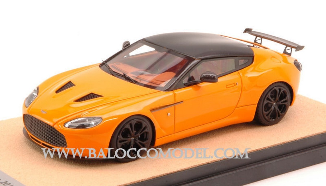 MODELLINO IN SCALA COMPATIBILE CON ASTON MARTIN V12 ZAGATO 2012 ORANGE W/BLACK ROOF ED.LIM.PCS 10 1:43 TECNOMODEL TMDMI52AL